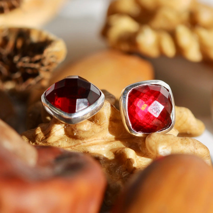 garnet stones stud earrings in silver 